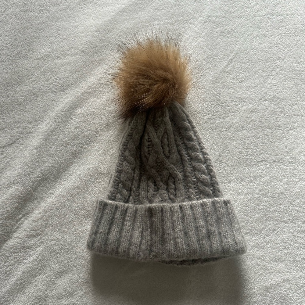 Elegant Gray Cable Knit Hat with Brown Pom Pom
